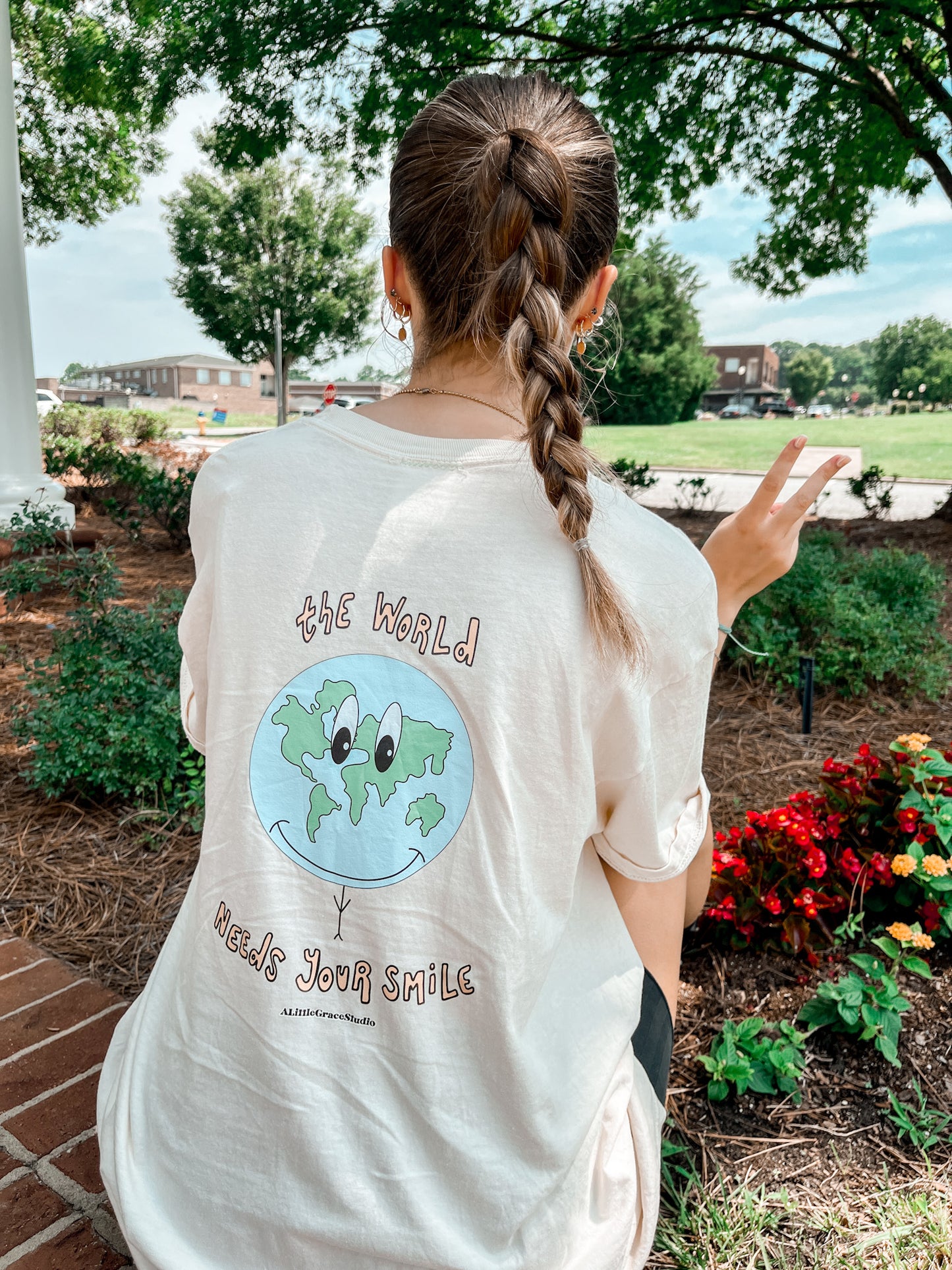 The World Needs Your Smile Tee